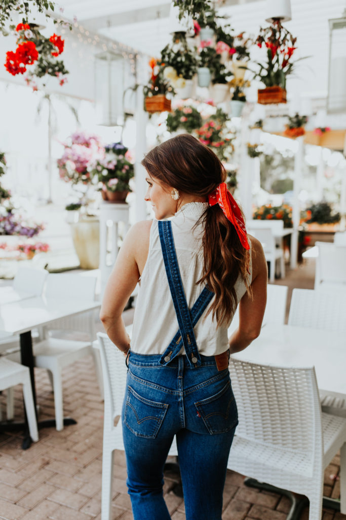 pregnant in overalls red hair bandana